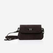 Сумка українського бренду ТМ  "Lucherino" стане хорошим придбанням не на один рік.  Невелика жіноча сумочка виготовлена з високоякісного шкірзамінника та якісної надійної фурнітури в кольорі - нікель. Одне відділення з однією кишенею на застібці.